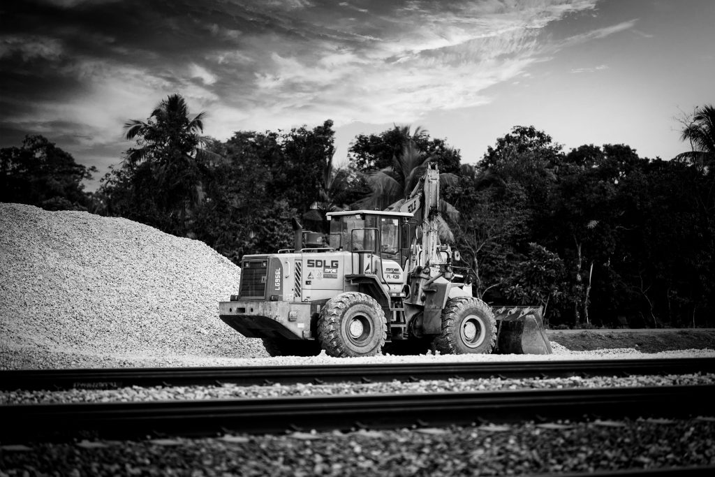 pexels photo 29333328 29333328 Monochrome photograph of an industrial loader at a construction site.